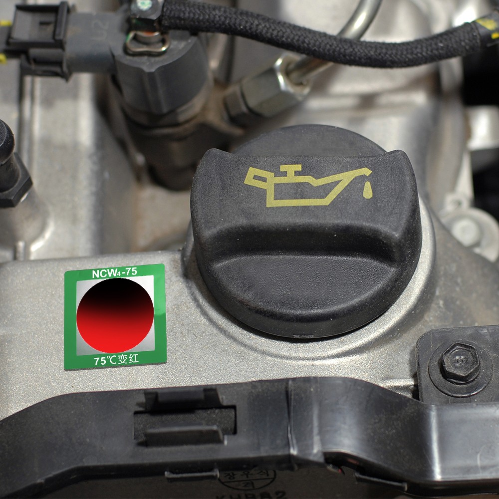 Adesivo reversibile per indicazione della temperatura